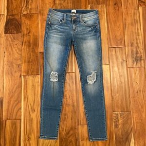 Sneak Peek distressed skinny jeans